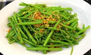 Rau muống xào bơ tỏi - 22.000 ₫ tại Madame Food - Mì Trộn Indomie - Trần Hữu Trang