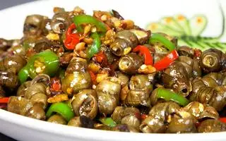 Hình ảnh Ốc vặn xào sa tế cay