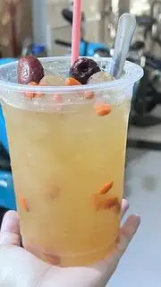 Hình ảnh Nước lê nấu đường phèn táo đỏ