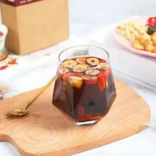Hình ảnh Trà Thảo Mộc Gừng Hoa Hồng Đường Đen