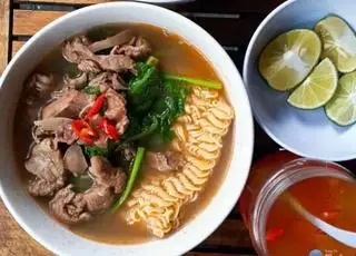 Hình ảnh Mì tim cật chua cay