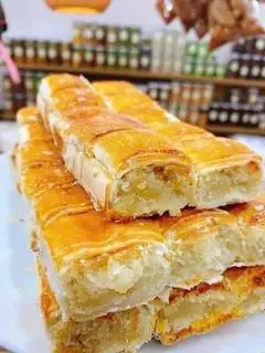 xếp dừa non nướng (hot) - 130.000 ₫ tại Bánh Bò Thốt Nốt Nguyễn Sơn - Lê Tự Tài