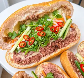 Bánh mì “siêu pate” - 40.000 ₫ tại Bánh Mì Cô Ba Hàng Xanh - Điện Biên Phủ