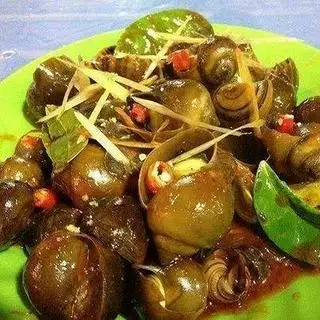 Hình ảnh Ốc mít xào me dừa