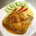 Hình ảnh Cơm gà sốt me đùi góc tư