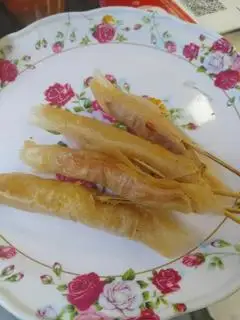 Hình ảnh 1 nem quấn lá bía