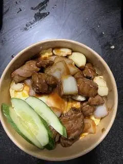 Cơm bò cháy tỏi phủ trứng - 68.000 ₫ tại Mì Trộn Phủ Trứng - Thành Thái