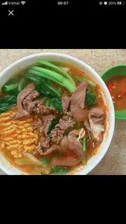 Hình ảnh Mì chua cay Tim heo (1/2 quả)
