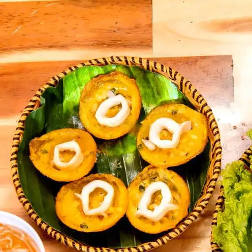 Bánh khọt mực - 35.000 ₫ tại Bánh Xèo & Bánh Khọt Rau Rừng Cây Sung - Nguyễn Văn Luông