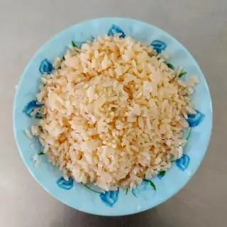 Cơm thêm nhỏ - 8.000 ₫ tại Phượng 4 - Cơm Gà Xối Mỡ - An Dương Vương