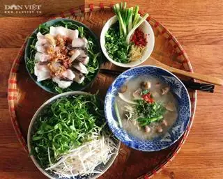 Hình ảnh combo (cháo cá phí lê +ly trà tắc ) bỏ vào hộp sạch sẽ