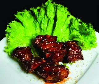 Sườn sốt chua ngọt - 225.000 ₫ tại Geylang Lor 9 - Cháo Ếch Singapore - Đông Du