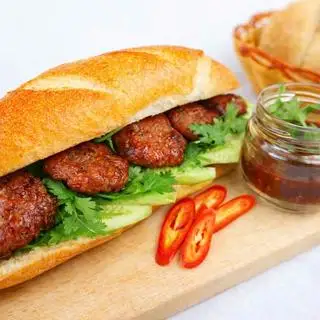 Bánh mì thịt nướng đậm vị + sốt tương - 35.000 ₫ tại Bánh Mì Thịt Nướng A.Quang 262 - Phan Đình Phùng