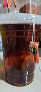 Trà đào - 15.000 ₫ tại Cô Mai - Bún Xào & Bún Chả Giò - Năm Châu
