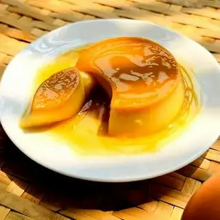 Bánh flan truyền thống ( 2 cái ) - 25.000 ₫ tại Bánh Flan Bà Châu - Trương Quốc Dung