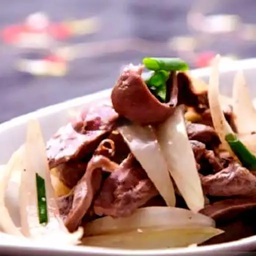 Hình ảnh Cơm tim xào củ hành