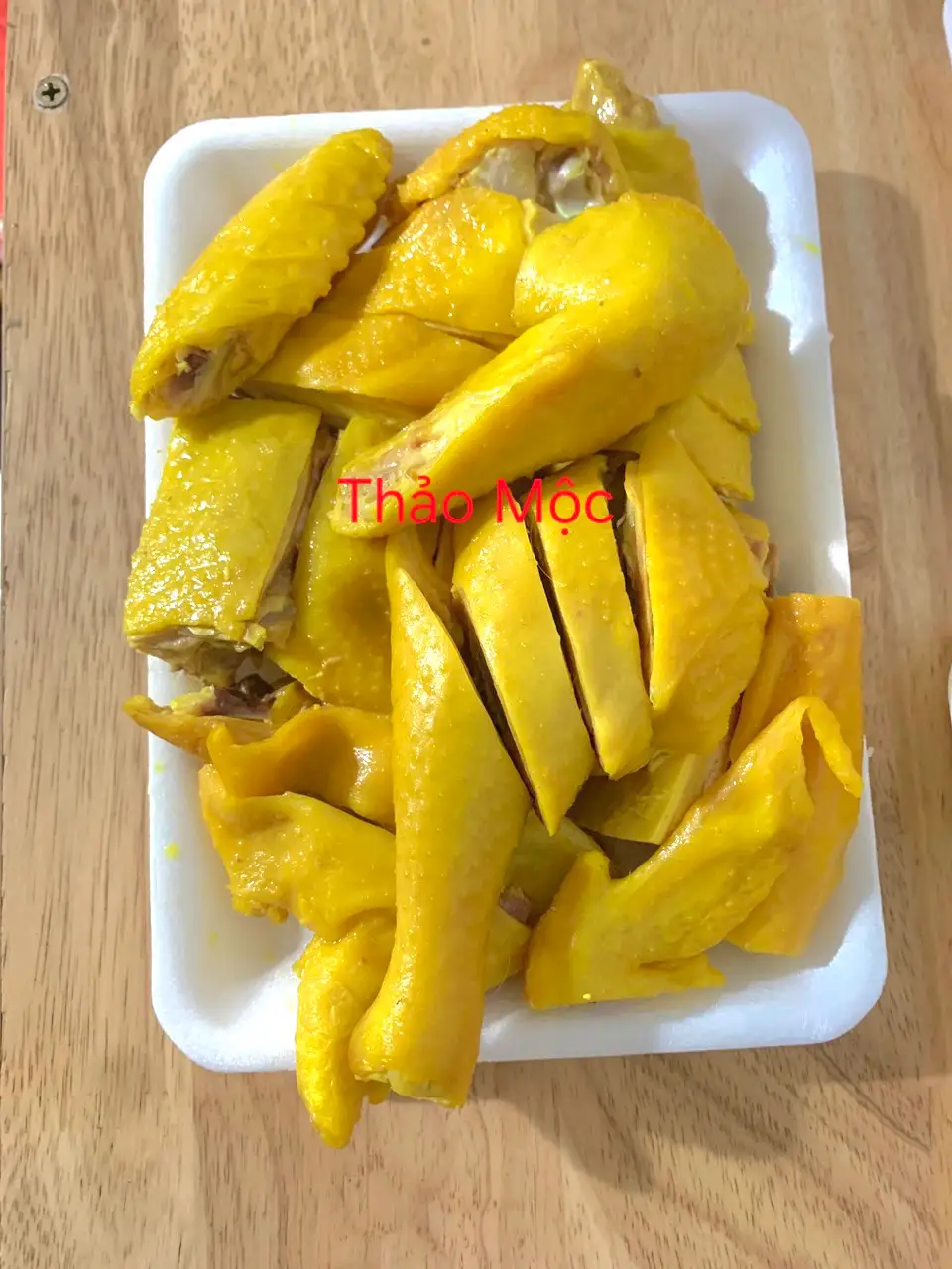 Hình ảnh 1/2 con gà ủ muối thảo mộc không đầu chân