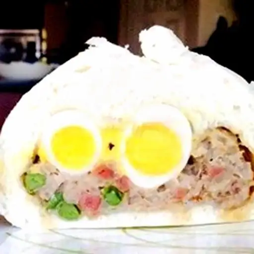 Bánh bao 1 trứng cút nóng  - 25.000 ₫ tại Bánh Mì Hà Nội Bắc Huyền - Nguyễn Sơn