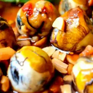 Hình ảnh Trứng cút lộn xào me