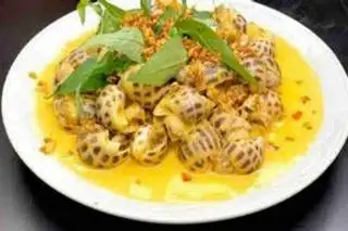 Hình ảnh Ốc hương sốt trứng muối 