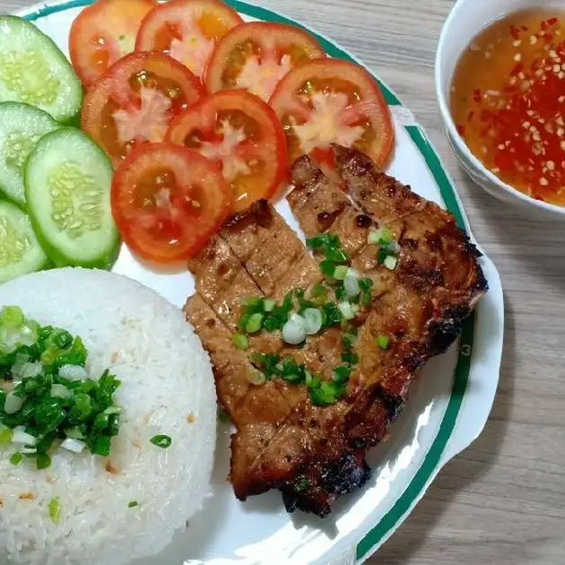 Cơm Thêm 1 Bịch - 7.000 ₫ tại Cơm Tấm Đường Ray & Bún Thịt Nướng - Đường 49