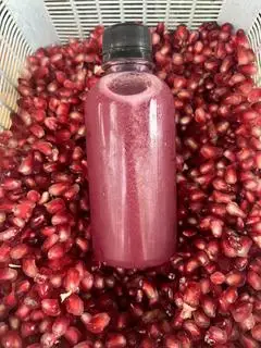Hình ảnh Lựu ép đóng chai