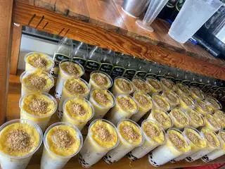 Hình ảnh Trà sữa kem trứng dừa nướng