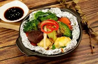Nấm nướng giấy bạc chay - 72.000 ₫ tại Nhà Hàng Chay Hồ Lô Gia - Phạm Văn Chí