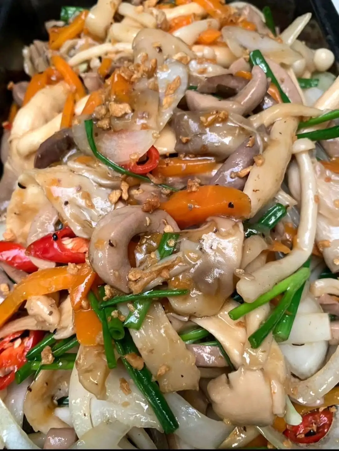 Hình ảnh Cơm tim heo xào nấm 
