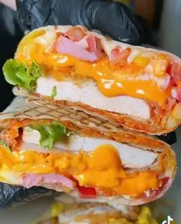 Tacos heo xông khói cay hàn L - 70.000 ₫ tại Tacos Huynh Đệ - Lê Văn Thọ