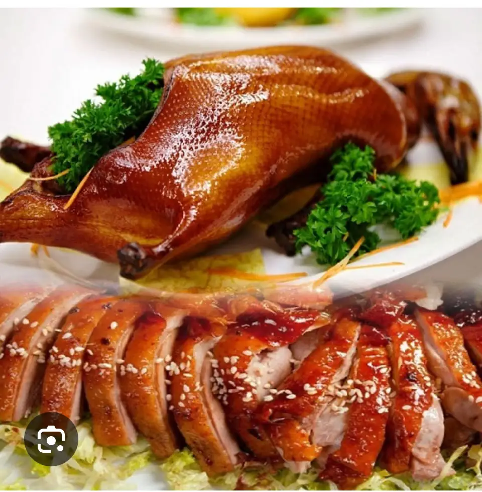 Hình ảnh vịt nướng lá mắc mật 