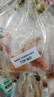 Hình ảnh Bánh tráng phơi sương ớt rim tóp mỡ
