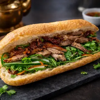 BÁNH MÌ VỊT QUAY - 39.000 ₫ tại Minh Tâm Bình Chánh - Bánh Mì Vịt Quay & Heo Quay - Nguyễn Trãi