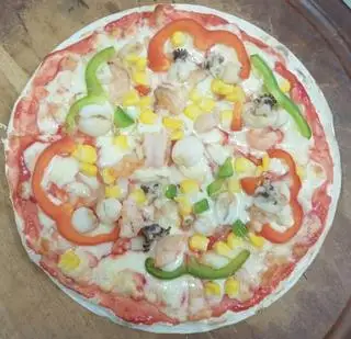 Pizza Hải sản size 18cm + CoCa 300ml - 110.000 ₫ tại Pizza Yummy - Tô Hiến Thành 