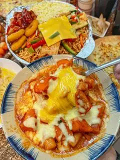 Gà sốt kem đút lò phô mai cheddar - 85.000 ₫ tại Xíu - Hotdog Phô Mai Trứng Muối Tan Chảy & Bánh Đúc Nóng - Thống Nhất