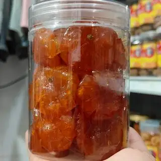 Hình ảnh mứt tắc hình hoa mai 