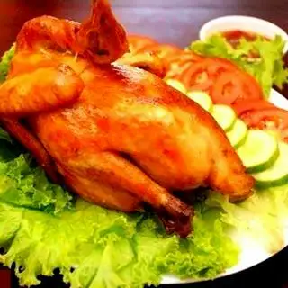 Hình ảnh Gà nướng lu - con