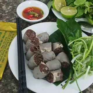 Dồi tiết - rau thơm - 55.000 ₫ tại Quán Huyền Vũ - Cháo Lòng & Tiết Canh - Bạch Đằng