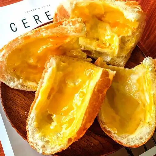 ( 1 ổ ) Bánh mì nướng bơ mật ong - 4 miếng ( 1 ổ ) - 14.500 ₫ tại Little Sip - Nước Ép & Thịt Xiên Nướng Hà Nội - Trần Khắc Chân