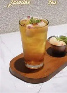 Hình ảnh Trà Vải Hoa Hồng