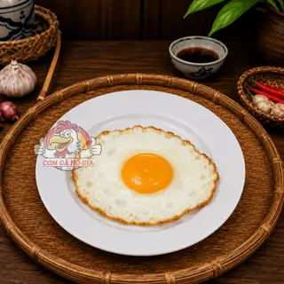 Trứng ốp la - 9.000 ₫ tại Hồ Gia - Cơm Gà Xối Mỡ - Hoàng Văn Thụ