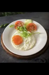 Ốp la thêm - 12.000 ₫ tại Cơm Thố Tiến Phát - Nguyễn Thái Bình