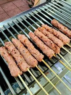 Hình ảnh 5 cái Nem chua nướng 