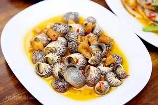 Hình ảnh ốc bong xào me