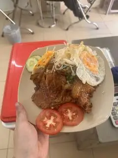 Hình ảnh Cơm tấm sườn + bì + chả  + ốp la (tặng canh rong biển thịt bằm) 