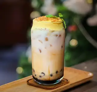 Hình ảnh Trà Sữa Trân Châu Đường Đen Kem Trứng Dừa Nướng
