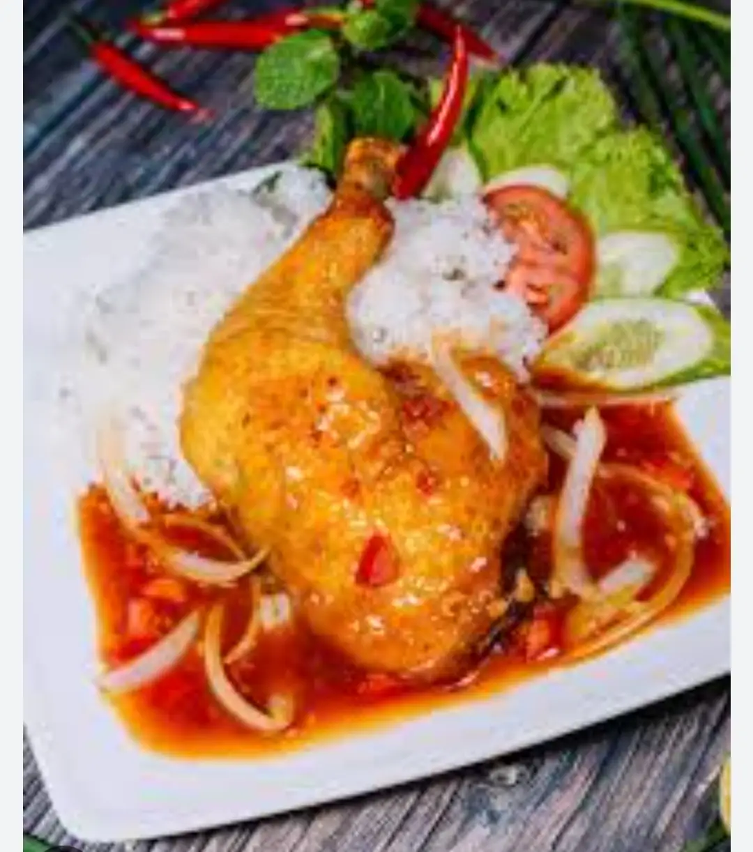 Cơm Chiên Đùi Gà Tỏi/Má Đùi Sốt Chua Ngọt Hoặc Mắm Me - 42.500 ₫ tại  Cơm Gà Xối Mỡ Quang Tâm - Đỗ Thị Lời