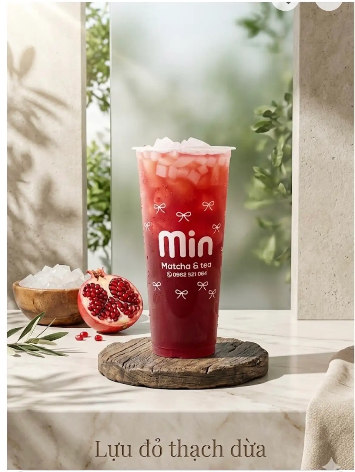 Hình ảnh Trà Lựu đỏ thạch dừa (700ml)