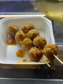Bò viên bi nướng sốt tomyum (4v) - 15.000 ₫ tại Ah Food Mì Trộn Tóp Mỡ & Ăn Vặt Trà Sữa - Phạm Thế Hiển