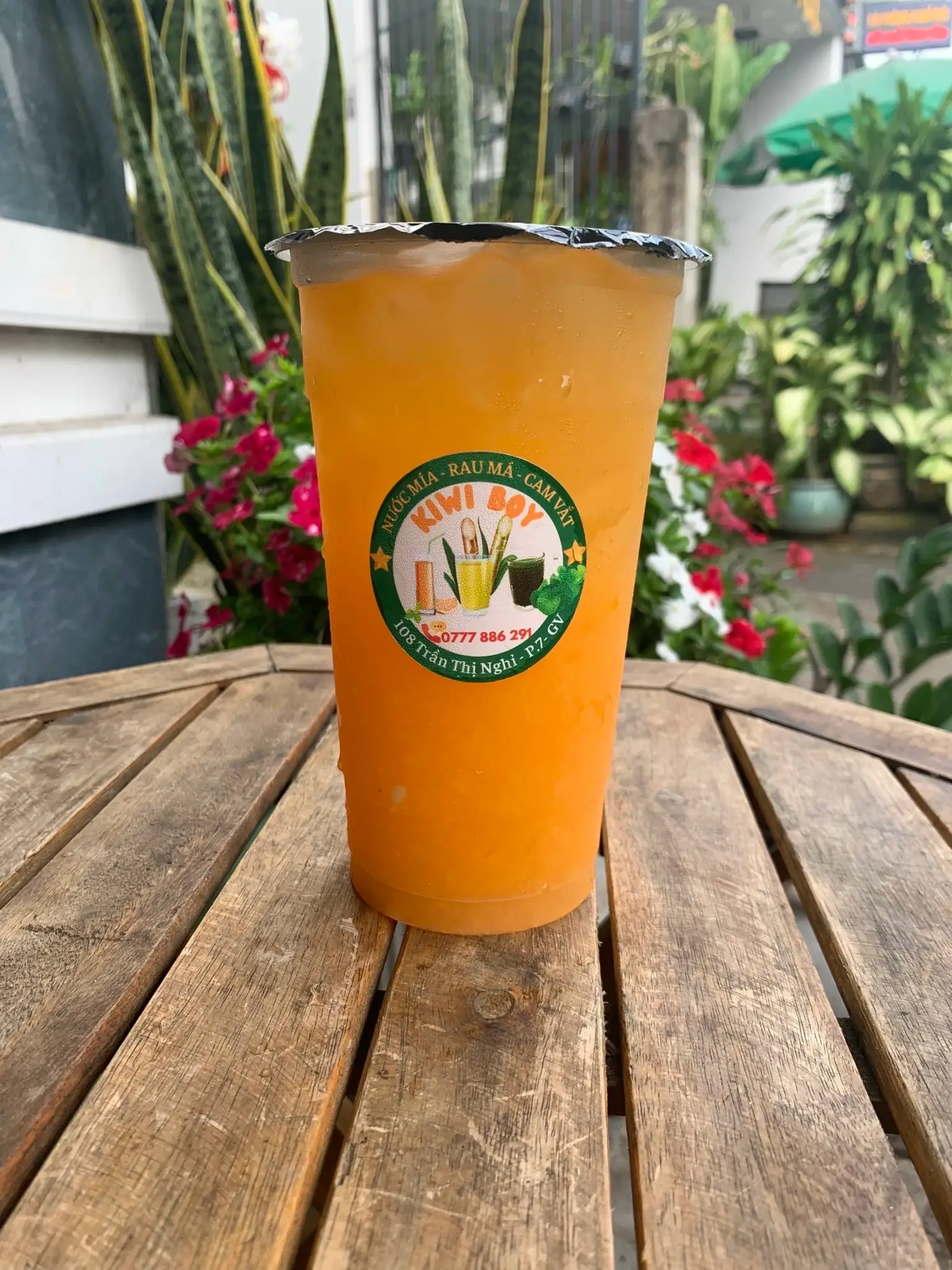 Cam vắt ly lớn 700ml - 30.000 ₫ tại Kiwi Boy Cafe & Tea - Sinh Tố, Nước Ép - Phan Văn Trị